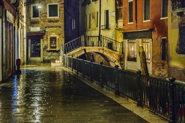 VENICE, ITALY, JANUARY - 2018 - Urban rainy night scene at historic center of venice, Italy - Fotoğraf, Görsel
