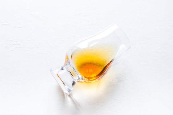 whiskey glass on white background - Фото, изображение