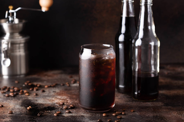 Cold brew iced coffee in glass bottles - Foto, afbeelding