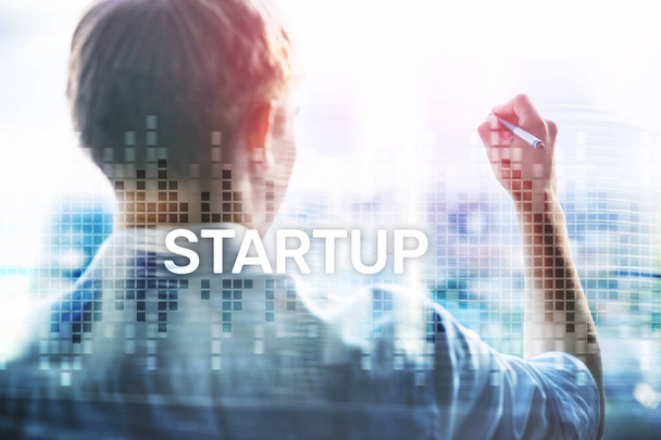 Startup concept with double exposure diagrams blurred background. - Φωτογραφία, εικόνα