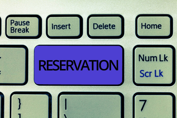 Handwriting text Reservation. Concept meaning Arrangement made so a seat somewhere is kept for someone - Photo, Image