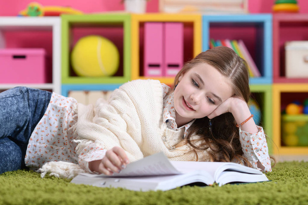 Cute  happy  girl  studying at home - Photo, Image