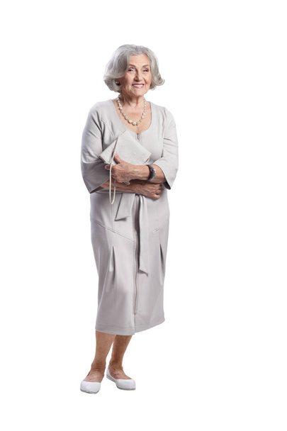 portrait of beautiful senior woman, posing against white background - Foto, afbeelding