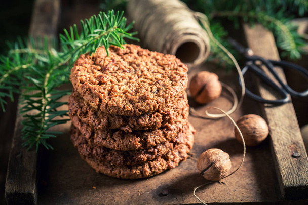 Homemade chocolate cookies with nuts and spruce - Foto, afbeelding