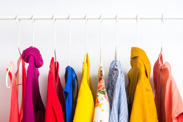 Different clothes on a hanger, lifestyle concept - Foto, Imagem