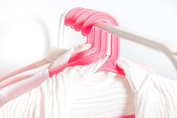 Different clothes on a hanger, lifestyle concept - Photo, image