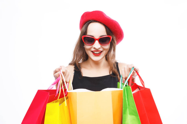 Pretty Woman Peeks Into A Shopping Bags - Photo, Image