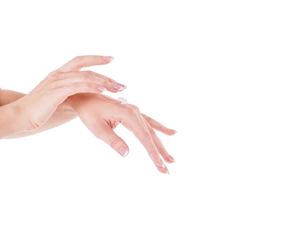 Beautiful women hands isolate, applying cream, massaging - Photo, Image
