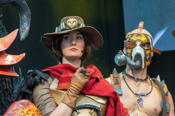 STUTTGART, GERMANY - JUN 30th 2018: Cosplay Contest - Jesse McCree from Overwatch by cosplayer Miss Weasleby -  at Comic Con Germany Stuttgart, a two day fan convention - Фото, зображення