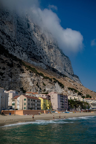 Gibraltar, United Kingdom, 2nd October 2018:- Colourful buildings along the seafront in Catalan Bay, Gibraltar. Gibraltar is a British Overseas Territory located on the southern tip of Spain. - Photo, image