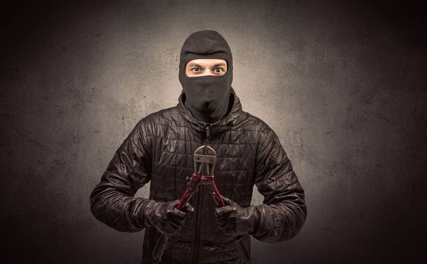 Burglar with tool. - Foto, imagen