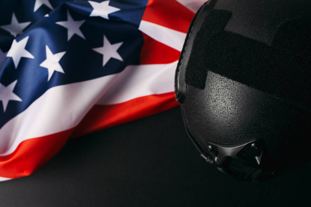 Military helmets and American flag on background - Foto, immagini