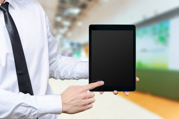 close up of Business man holding on digital tablet - Foto, imagen