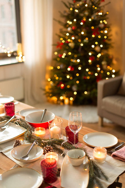 table served for christmas dinner at home - Фото, изображение
