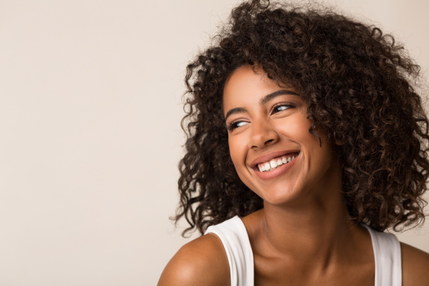 Beauty portrait of black woman on light background - Photo, Image