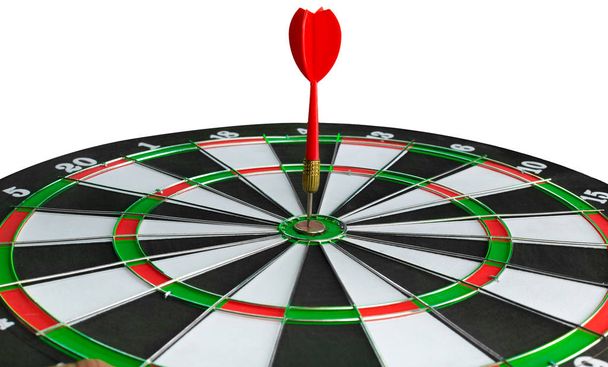 dart arrow in target center of dartboard - Фото, изображение
