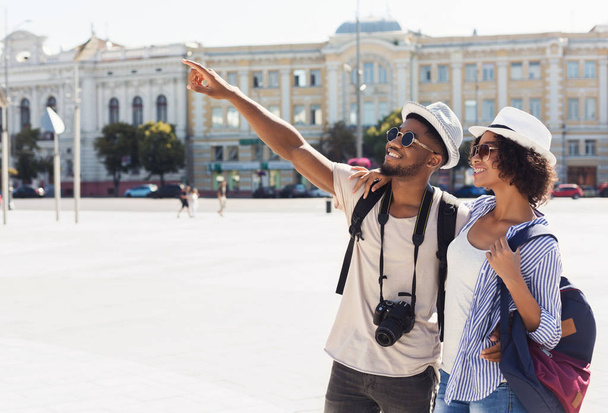 African-american couple of tourists sightseeing in city - Photo, Image