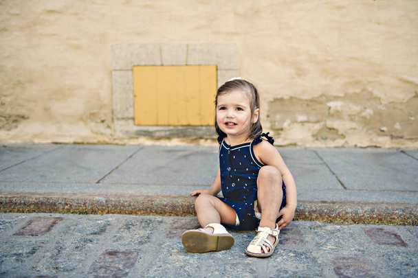two years old child girl on urban street - Fotografie, Obrázek