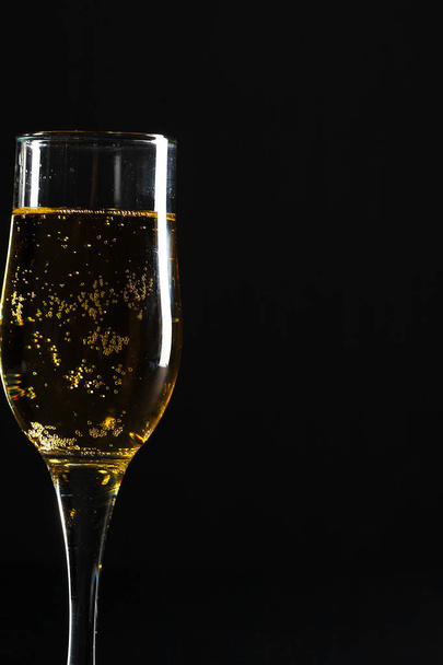glass of champagne on black background - Photo, Image