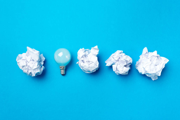 close up of balls of white paper on blue background  - Foto, Bild