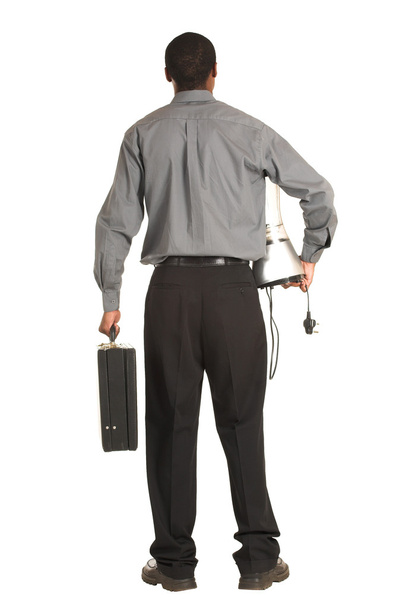 Businessman grey shirt, carrying a leather suitcase and a food blender. - Fotografie, Obrázek