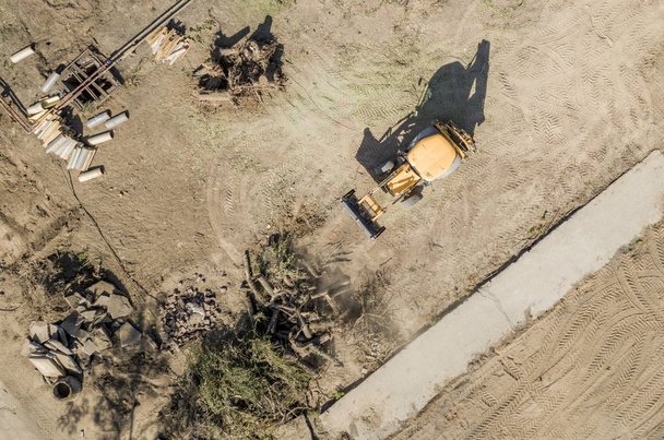 vista aérea superior de la excavadora cargadora de ruedas grandes excavadora trabajo en un proyecto de construcción f
 - Foto, imagen