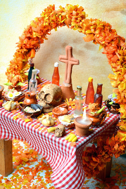 Day of the dead altar with pan de muerto, cempasuchil flowers and candles - Photo, Image