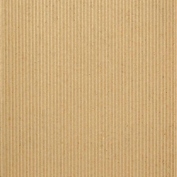 Un cartón ondulado marrón útil como fondo, de color pastel suave
 - Foto, Imagen