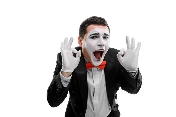 Cheerful male mime showing ok - 写真・画像
