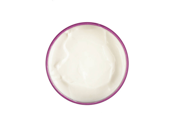 Crema hidratante abierta sobre fondo blanco
 - Foto, Imagen