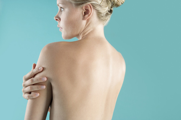 Close up view of a woman's bare back. - Photo, image