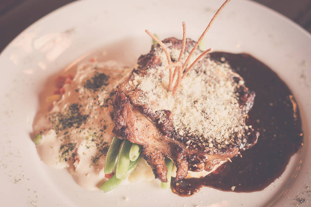 Chicken chop, Mashed Potato, Selected Vegetables, Cream Sauce, Black Pepper Sauce, Parmesan Cheese - Photo, Image