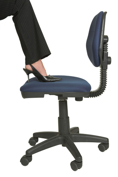 Foot of a woman on a chair - Fotoğraf, Görsel