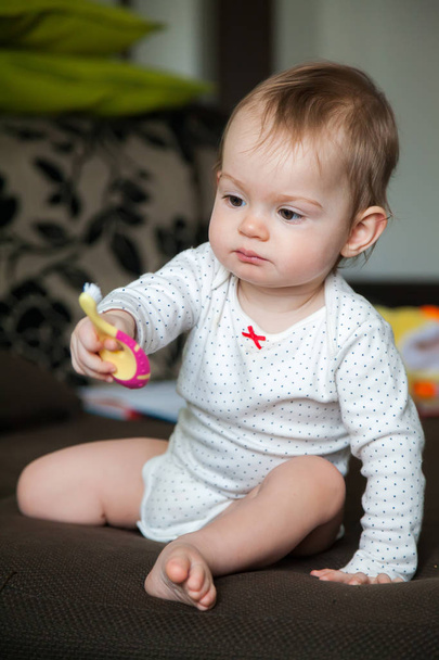 baby girl with toothbrush refusing to brush her teeth - Фото, зображення
