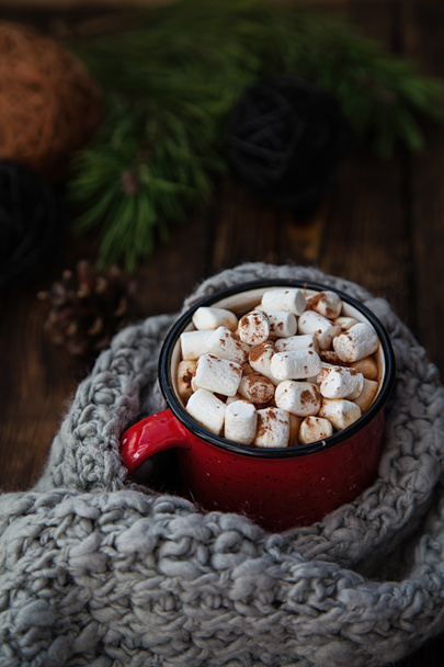 red Cup with hot drink with marshmallow on wooden christmas background - Фото, зображення