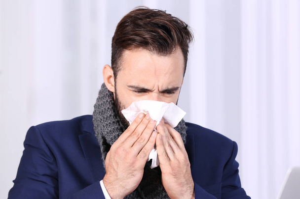 Ill businessman suffering from cough in office - Φωτογραφία, εικόνα