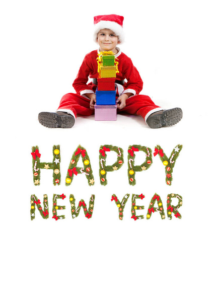 Boy holding a christmas box gift isolated on white background. 2019 New Year greeting - Fotó, kép