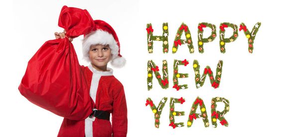 Boy holding a sack isolated on white background. New Year greeting - 写真・画像