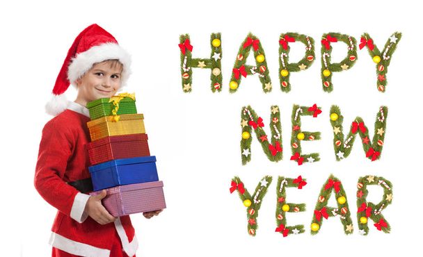 Boy holding a christmas box gift isolated on white background. 2019 New Year greeting - Фото, зображення