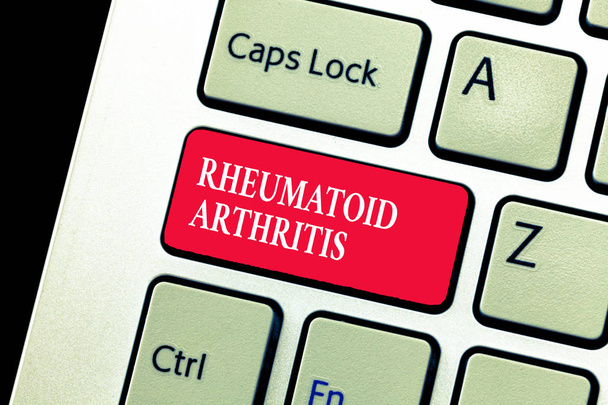 Handgeschreven tekst schrijven van reumatoïde artritis. Begrip betekenis auto-immune ziekte die leiden pijn in de gewrichten en schade tot kan - Foto, afbeelding