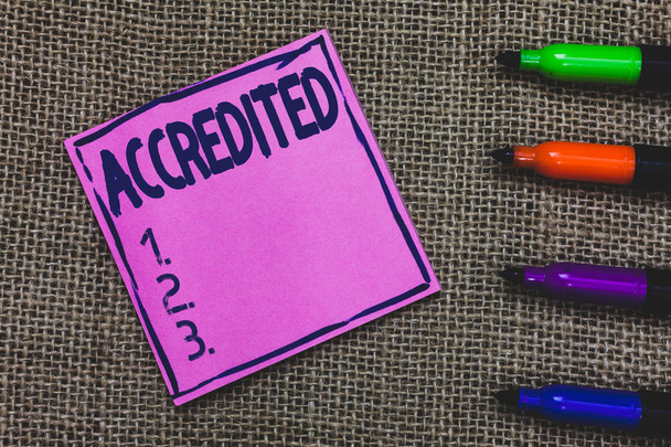 Conceptual hand writing showing Accredited. Business photo showcasing Having credits authority to something Certified Authorized Purple Paper Important reminder Markers Jute background. - Photo, Image