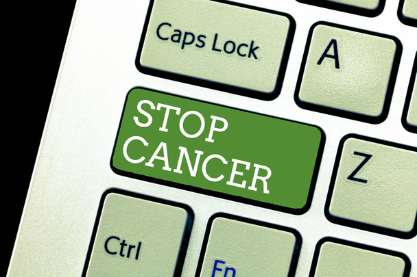 Escribir texto a mano Detener el cáncer. Concepto significado Práctica de tomar medidas activas para reducir la tasa de cáncer
 - Foto, Imagen