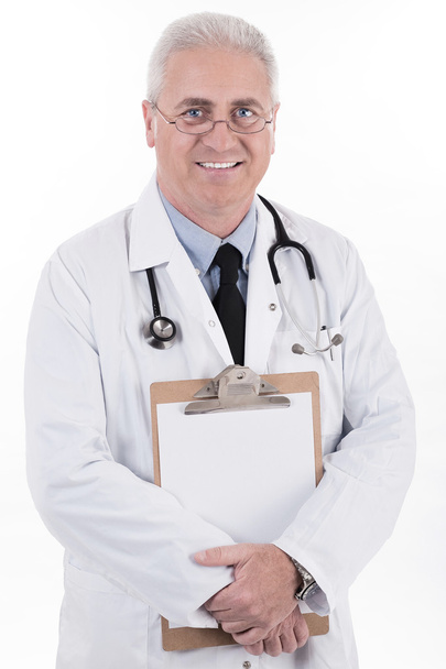 Senior doctor holding clipboard - Photo, Image