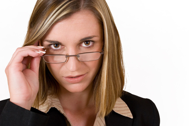 Business woman holding reading glasses - Фото, изображение