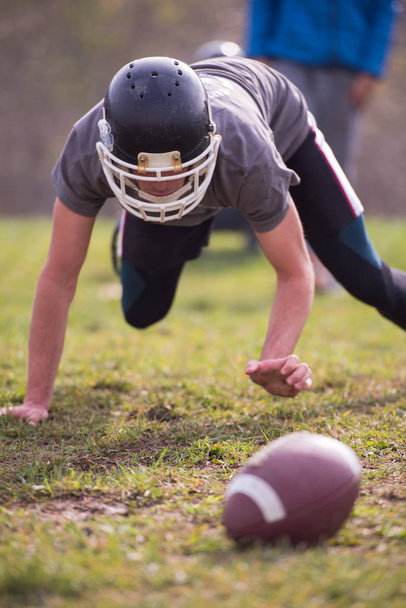 young american football player in action during the training at field - Foto, imagen