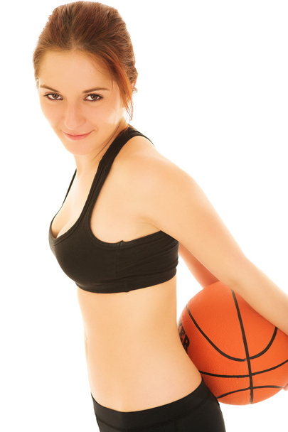 young adult Caucasian woman holding a basketball - Fotó, kép