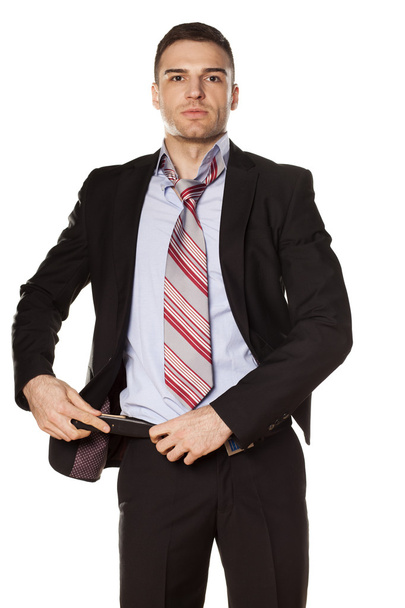 zakenman vastgemaakt de gordel - Foto, afbeelding