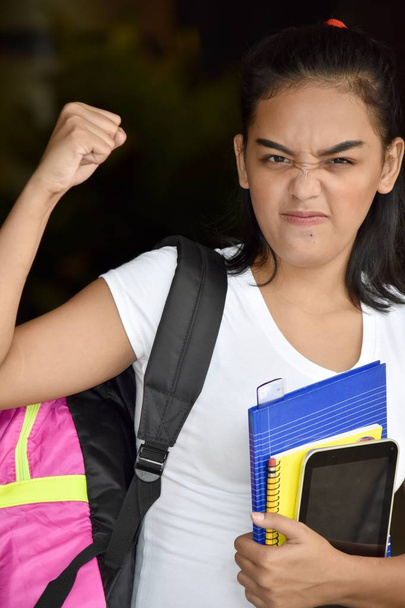 Upset Cute Minority Girl Student With Notebooks - 写真・画像