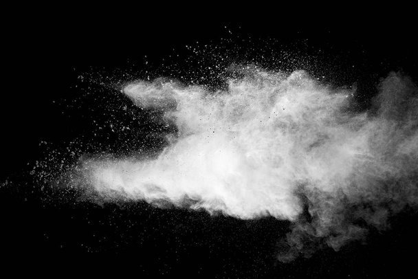 Explosion of white dust on black background. - Photo, Image