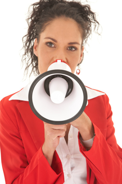 Young adult Caucasian businesswoman speaking through a megaphone - Фото, изображение